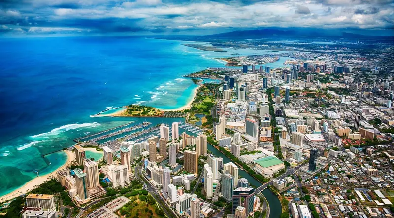 Aerial view of Waikiki, the Ala Wai harbour and Honolulu's coastline on an Oahu helicopter tour